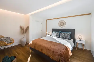 Ein Bett oder Betten in einem Zimmer der Unterkunft Bijou Lohnerblick - sonnig mit Terrasse&Bergsicht