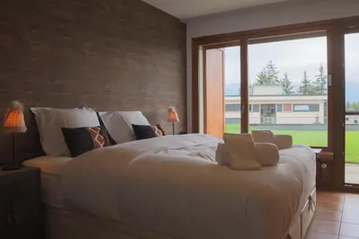 Ein Bett oder Betten in einem Zimmer der Unterkunft Croisée A