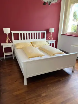 Ein Bett oder Betten in einem Zimmer der Unterkunft APARTMENT PETER