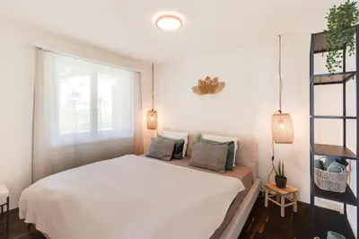 Ein Bett oder Betten in einem Zimmer der Unterkunft Bergoase für zwei - mit Terrasse & Bergkulisse