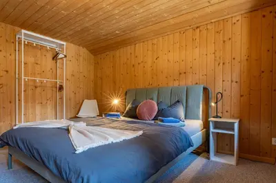 Ein Bett oder Betten in einem Zimmer der Unterkunft Charming, well-equipped Alpine apartment
