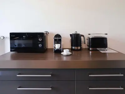 Küche/Küchenzeile in der Unterkunft Apartment Europa Ouest - APT 74 by Interhome