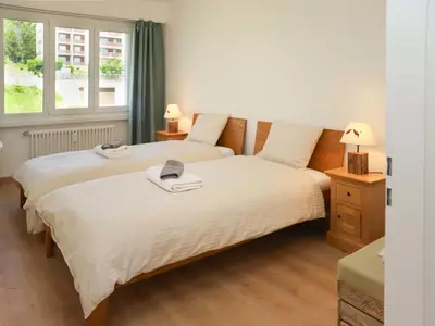 Ein Bett oder Betten in einem Zimmer der Unterkunft Apartment Europa Ouest - APT 74 by Interhome