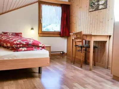 Ein Bett oder Betten in einem Zimmer der Unterkunft Apartment Wiedersehen by Interhome