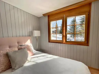 Ein Bett oder Betten in einem Zimmer der Unterkunft Vieux Valais EG Ost