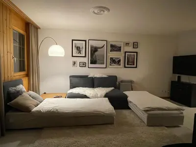 Ein Bett oder Betten in einem Zimmer der Unterkunft Vieux Valais EG Ost