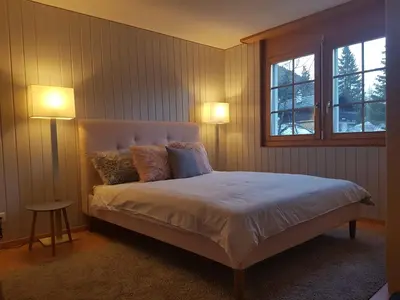 Ein Bett oder Betten in einem Zimmer der Unterkunft Vieux Valais EG Ost