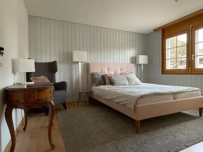 Ein Bett oder Betten in einem Zimmer der Unterkunft Vieux Valais EG Ost