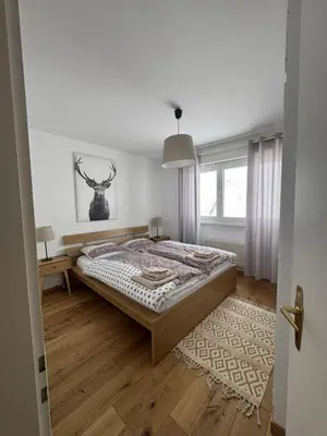 Ein Bett oder Betten in einem Zimmer der Unterkunft Appartement 4.5 pièces Crans-Montana