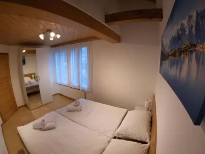 Ein Bett oder Betten in einem Zimmer der Unterkunft Fine&Pine Center Apartment