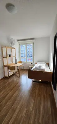 Ein Bett oder Betten in einem Zimmer der Unterkunft House of Thun Full Apartment