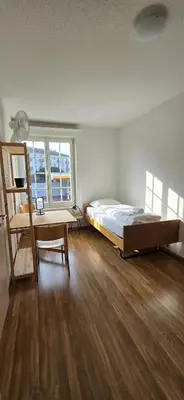 Ein Bett oder Betten in einem Zimmer der Unterkunft House of Thun Full Apartment
