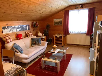 Ein Sitzbereich in der Unterkunft Ferienwohnung Haus Mühlebach