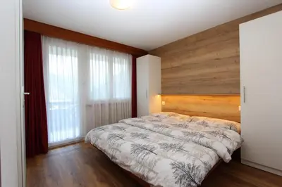 Ein Bett oder Betten in einem Zimmer der Unterkunft Haus Primavera
