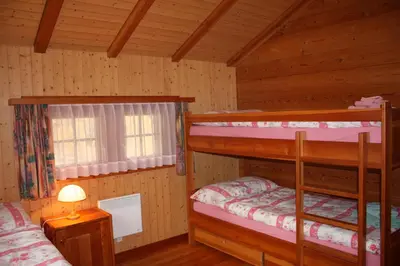 Ein Bett oder Betten in einem Zimmer der Unterkunft Chalet Zwächta