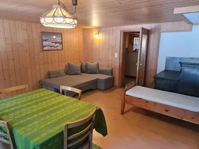 Ein Bett oder Betten in einem Zimmer der Unterkunft Ferienwohnung Berner Oberland - Guttannen