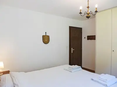 Ein Bett oder Betten in einem Zimmer der Unterkunft Apartment Eden Roc 56 by Interhome