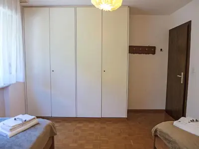 Ein Bett oder Betten in einem Zimmer der Unterkunft Apartment Eden Roc 56 by Interhome