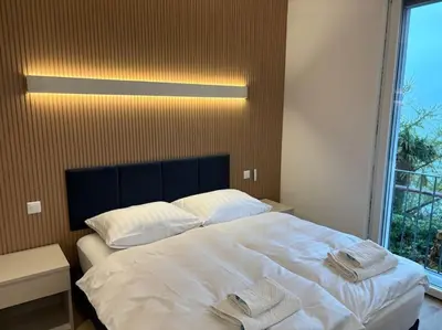 Ein Bett oder Betten in einem Zimmer der Unterkunft Lake Dream