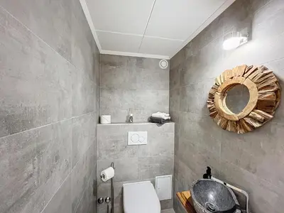 Ein Badezimmer in der Unterkunft Réséda