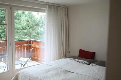 Ein Bett oder Betten in einem Zimmer der Unterkunft Zermatt La Vallée