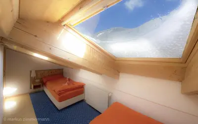 Ein Bett oder Betten in einem Zimmer der Unterkunft Haus Maryland