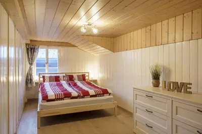 Ein Bett oder Betten in einem Zimmer der Unterkunft StayBrienz - Lake Brienz Family Holiday Apartment