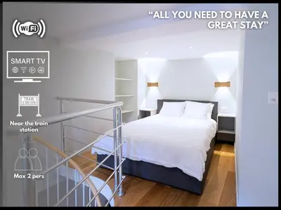 Ein Bett oder Betten in einem Zimmer der Unterkunft Studio-duplex Tower