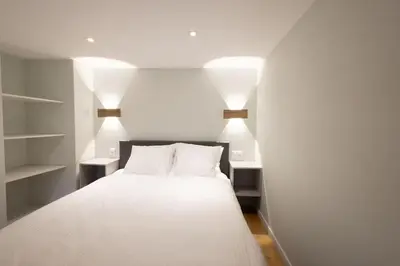 Ein Bett oder Betten in einem Zimmer der Unterkunft Studio-duplex Tower