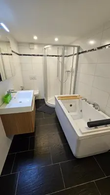 Ein Badezimmer in der Unterkunft GARDEN