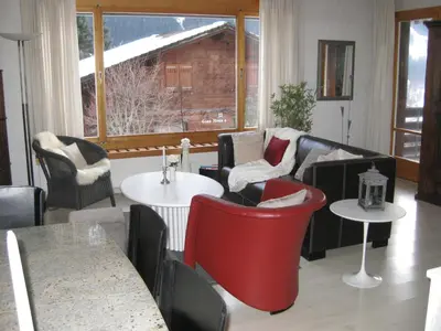 Ein Sitzbereich in der Unterkunft Casa Almis, Grindelwald