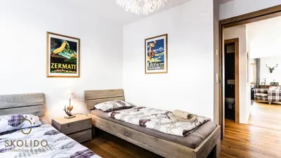 Ein Bett oder Betten in einem Zimmer der Unterkunft Haus Golmenegg, Riederalp