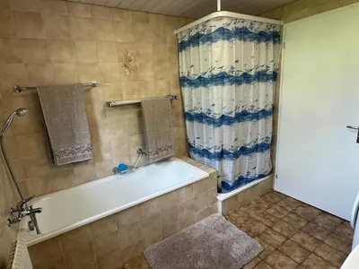 Ein Badezimmer in der Unterkunft See und Berge Family
