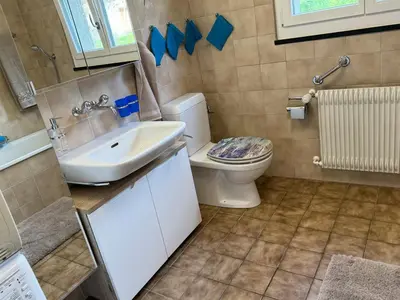 Ein Badezimmer in der Unterkunft See und Berge Family