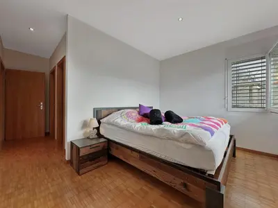 Ein Bett oder Betten in einem Zimmer der Unterkunft Family Mountain Hideway in the Swiss Alps
