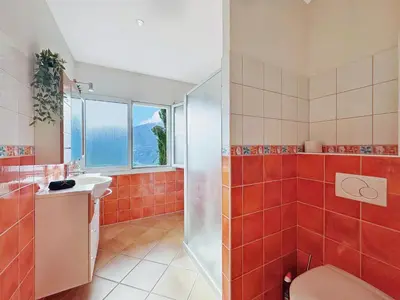 Ein Badezimmer in der Unterkunft Family Mountain Hideway in the Swiss Alps