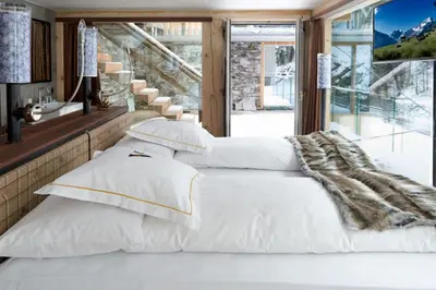 Ein Bett oder Betten in einem Zimmer der Unterkunft Luxury Loft by Heinz Julen