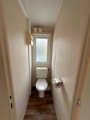 Ein Badezimmer in der Unterkunft Cottage 4