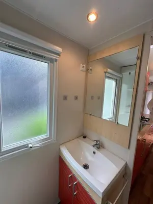 Ein Badezimmer in der Unterkunft Cottage 4
