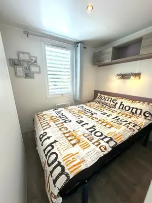 Ein Bett oder Betten in einem Zimmer der Unterkunft Cottage 2