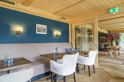 Ein Sitzbereich in der Unterkunft Boutique Hotel Panorama Grindelwald