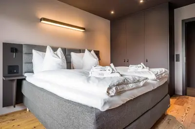 Ein Bett oder Betten in einem Zimmer der Unterkunft Apartment Neuenhaus 4.5 – GRIWA RENT AG