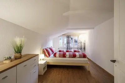 Ein Bett oder Betten in einem Zimmer der Unterkunft StayBrienz - Lake Brienz Holiday House