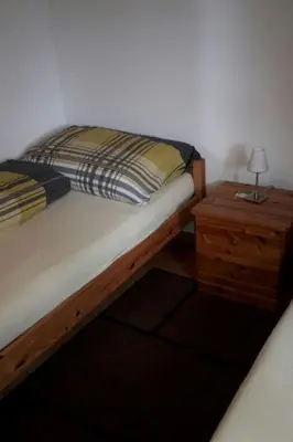 Ein Bett oder Betten in einem Zimmer der Unterkunft Apartment Konkordia 2 EG Süd-Ost by Interhome