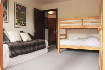 Ein Bett oder Betten in einem Zimmer der Unterkunft Les Sérandes