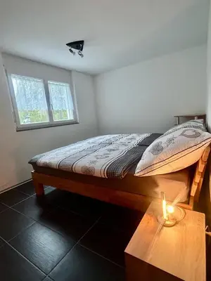 Ein Bett oder Betten in einem Zimmer der Unterkunft Gemütliche Wohnung mit Bergblick