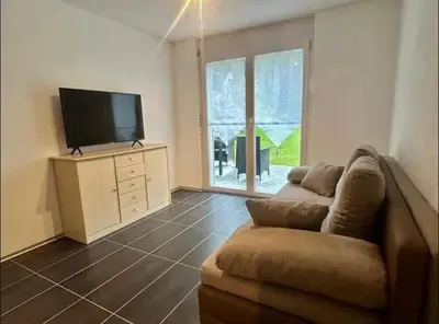 TV/Unterhaltungsangebot in der Unterkunft Gemütliche Wohnung mit Bergblick