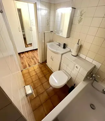 Ein Badezimmer in der Unterkunft Perle Apartment