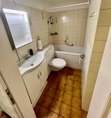 Ein Badezimmer in der Unterkunft Perle Apartment