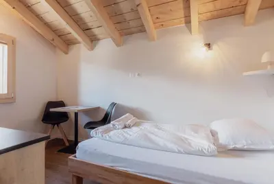 Ein Bett oder Betten in einem Zimmer der Unterkunft Studio rénové à Grimentz